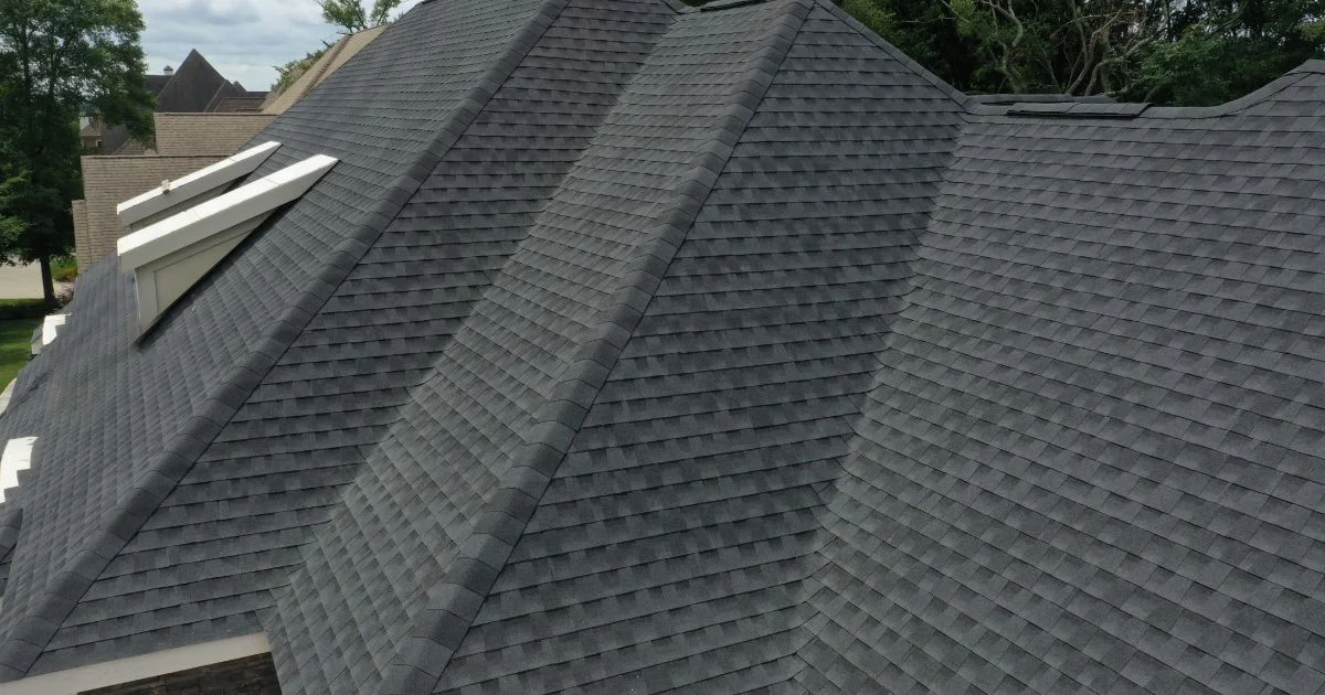 Aerial view of newly installed asphalt shingle residential roof
