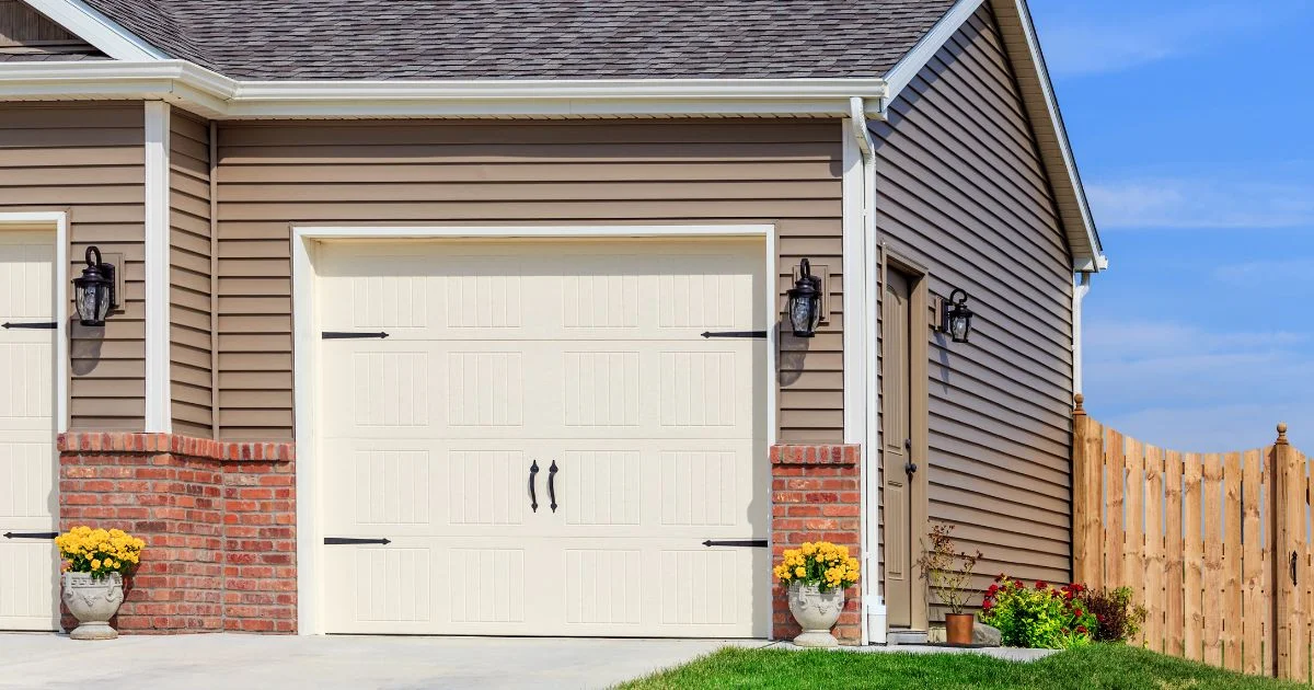 Home exterior with vinyl siding and brick accents